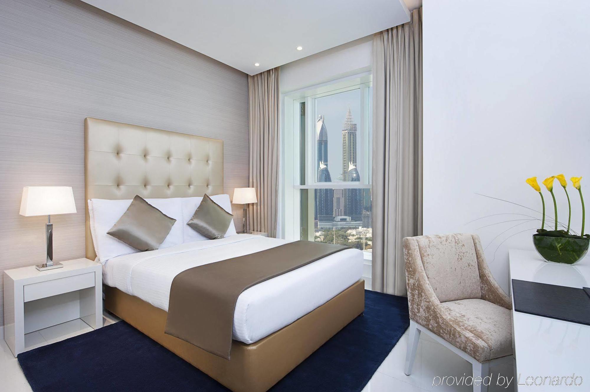 Damac Maison The Vogue Дубай Екстер'єр фото A bedroom at the hotel