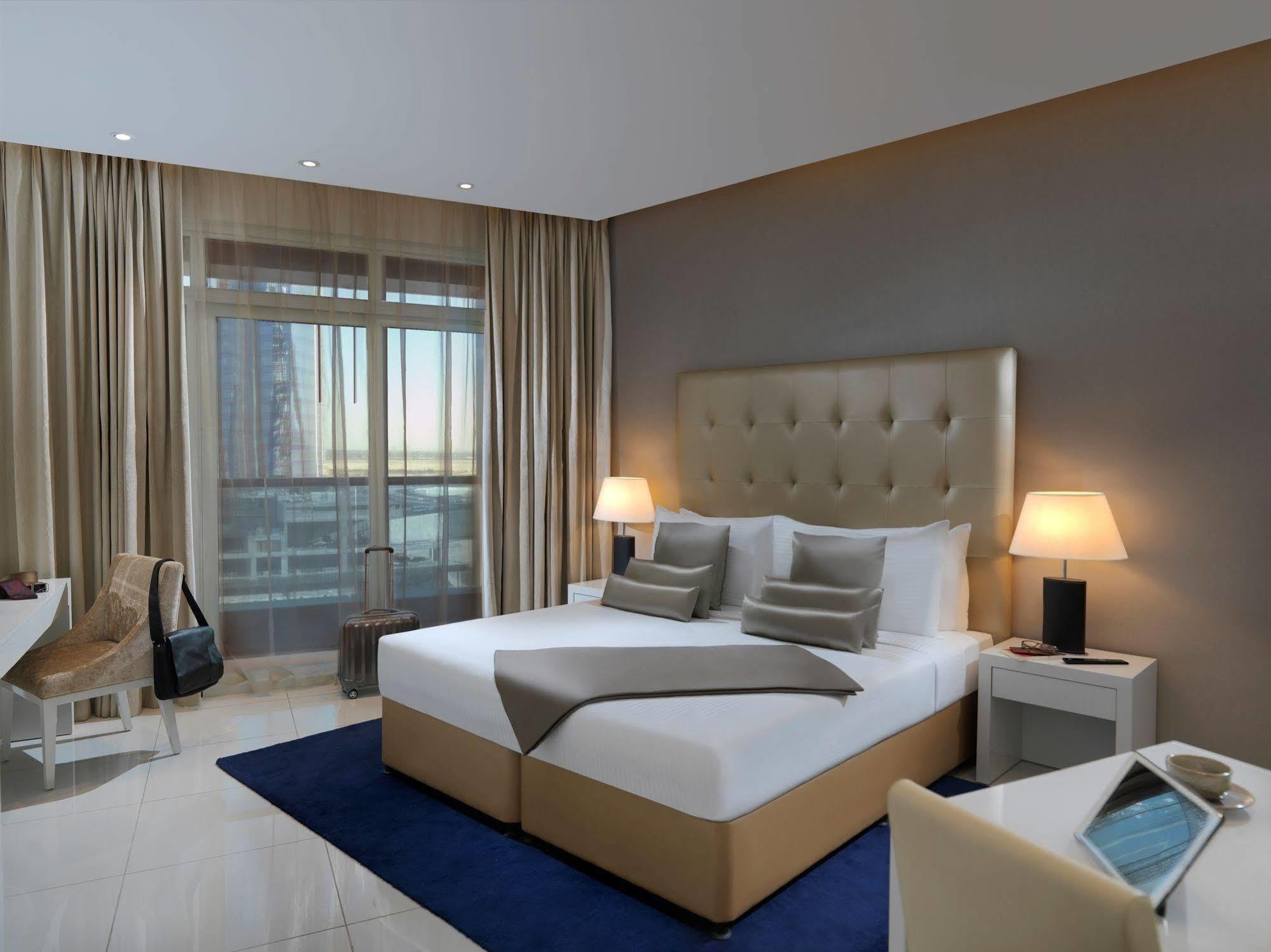 Damac Maison The Vogue Дубай Екстер'єр фото A bedroom at the hotel