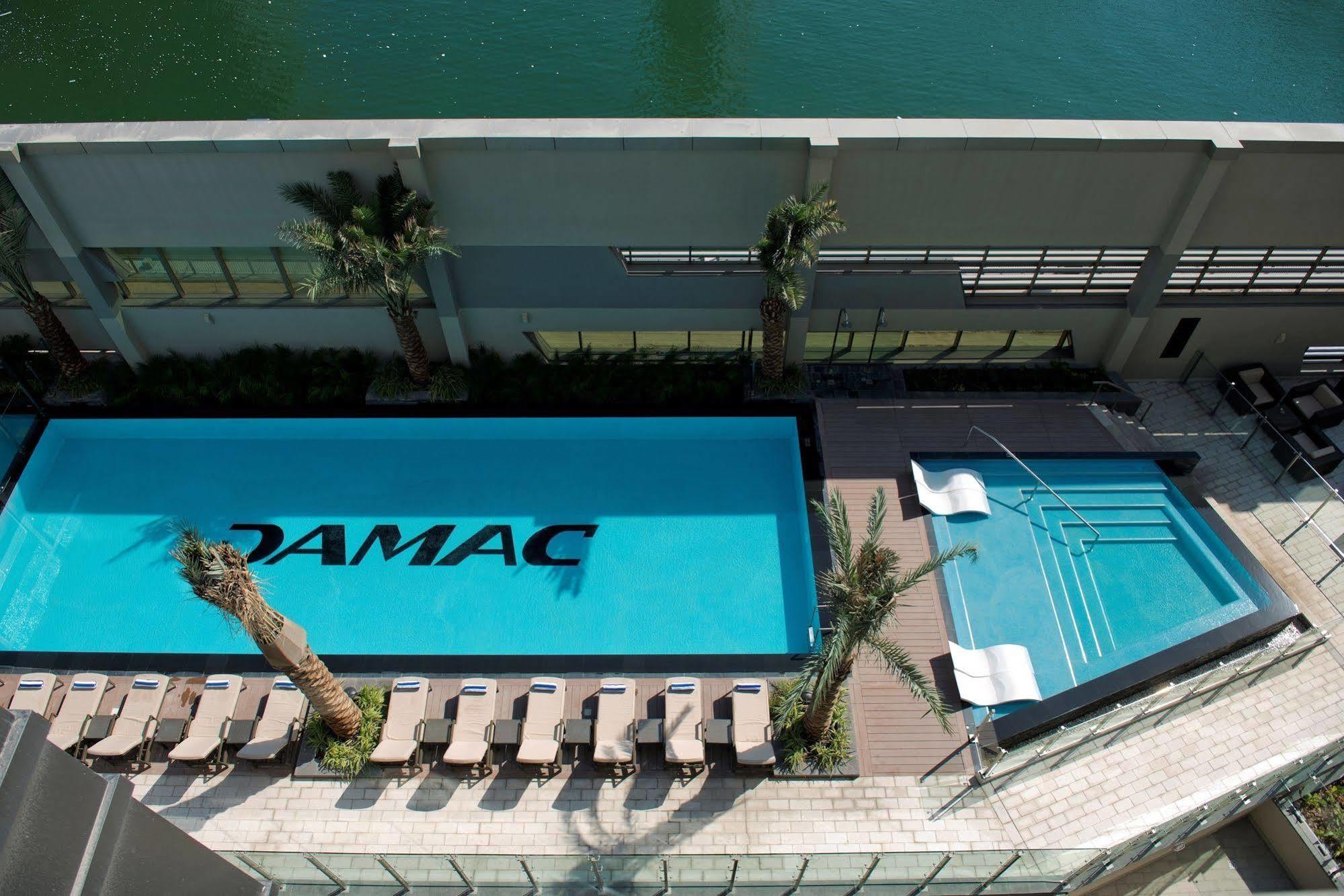 Damac Maison The Vogue Дубай Екстер'єр фото The pool at the TAMAC headquarters